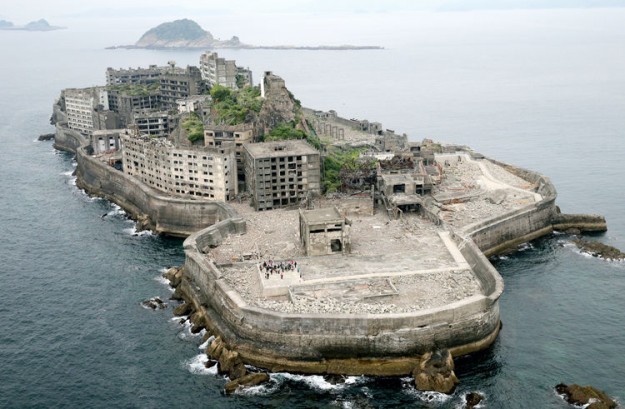 NAGASAKI, JAPAN - APRIL 23: (CHINA OUT, SOUTH KOREA OUT) In this aerial image, Hashima Island, commonly known as the battleship island is seen on April 23, 2015 in Nagasaki, Japan. The Island had been a coal complex and more than 5,000 people resided in 1960s, now uninhabited and only accept reserved visitors. (Photo by The Asahi Shimbun via Getty Images)