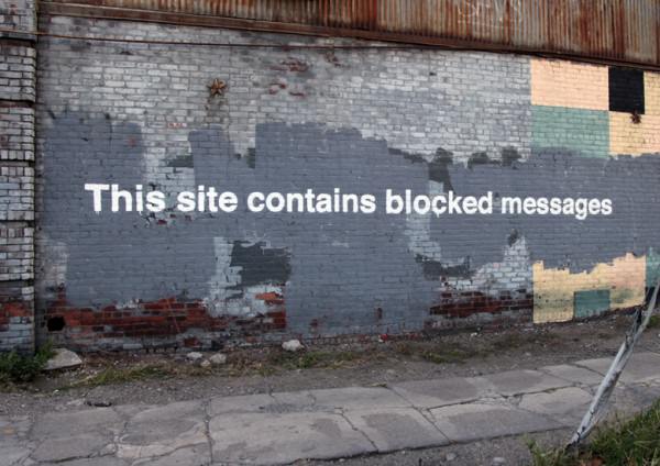 By-Banksy-This-site-contains-blocked-messages.-In-Greenpoint-New-York-USA-1-600x424
