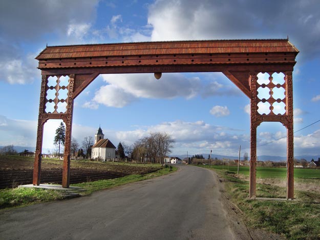 Hand-carved-wooden-gate-in-Imecsfalva,-Szekely-Land,-Transylvania